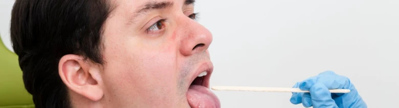 Man with tongue swabbed