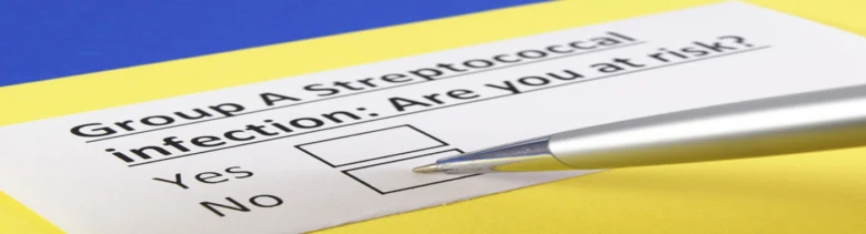 Tiskopis pro vyhodnocení rizika streptokokové infekce s tužkou.