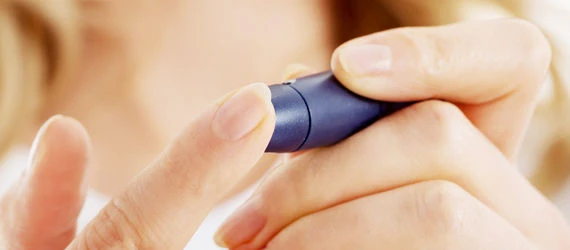 Insulin pen in hand