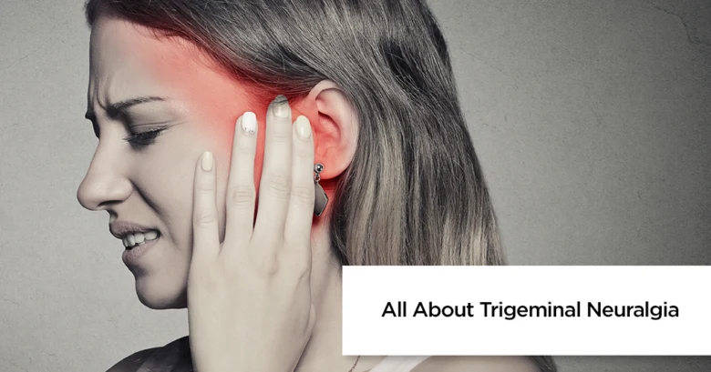 Woman holding head in pain