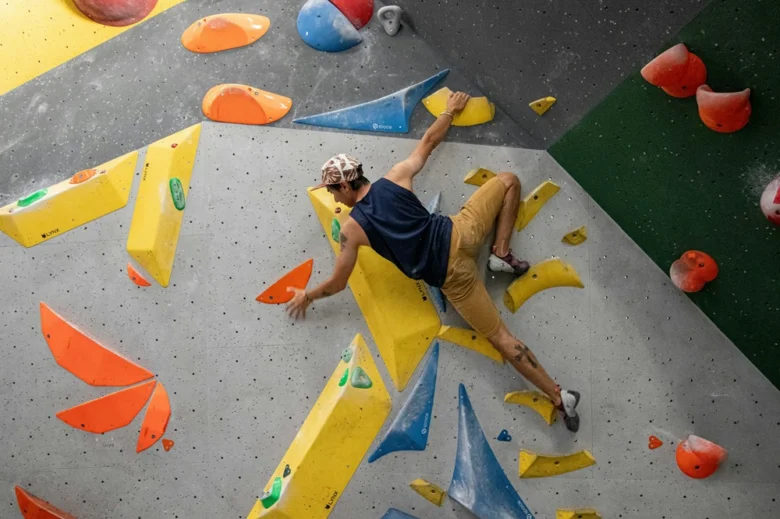 Man climbing indoor wall